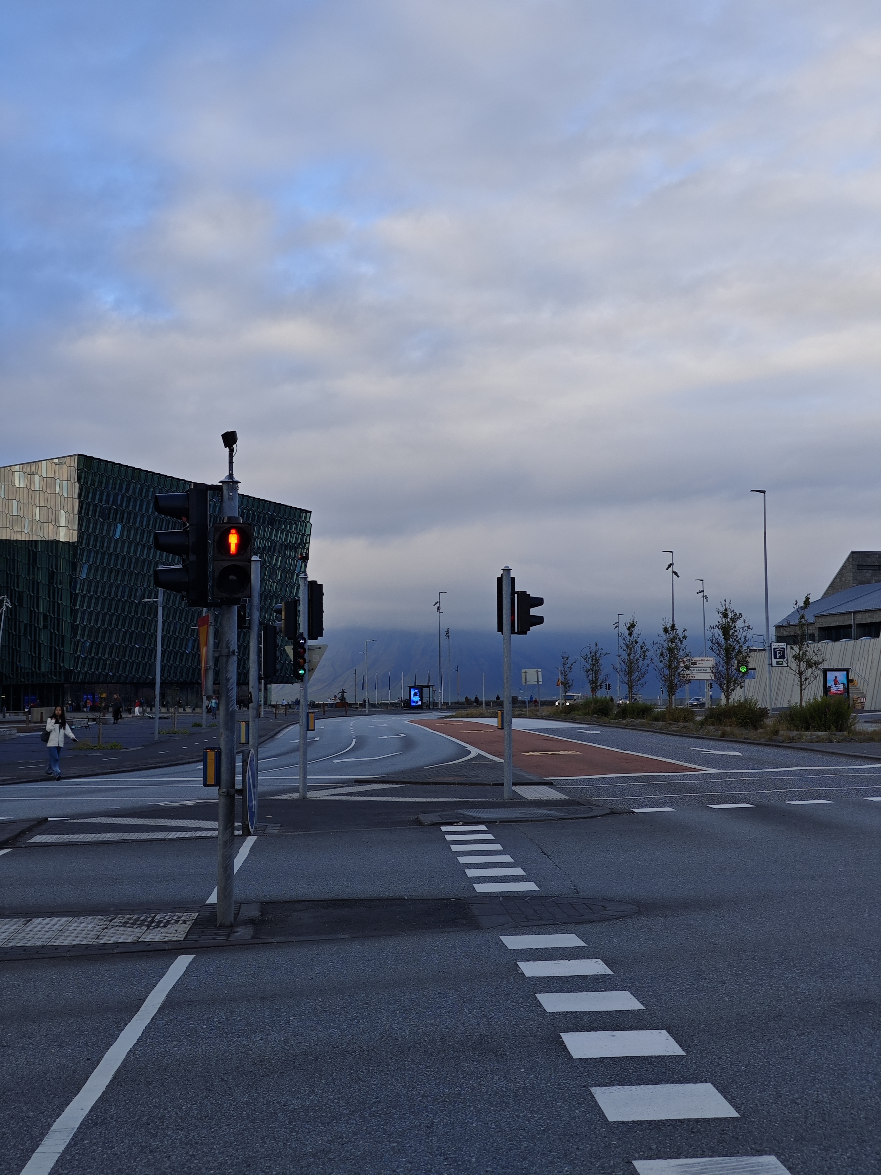 City streets on a sunny day. You can see Mount Esja across the sea!